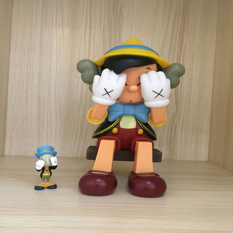 Figura Coleccionable de Vinilo de Pinocho Kaws